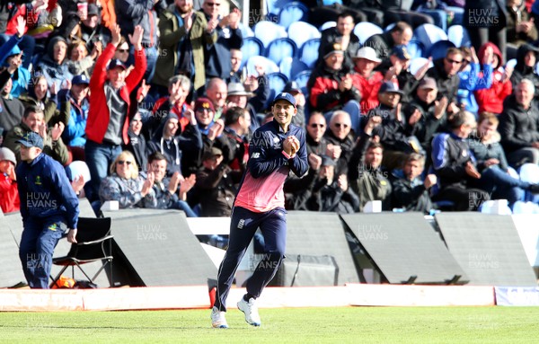 060617 - England v New Zealand - ICC Champions Trophy - Alex Hales of England celebrates after catching Corey Anderson of New Zealand