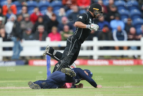 060617 - England v New Zealand, ICC Champions Trophy 2017, Cardiff - Neil Broom of New Zealand is forced to leap over Jason Roy of England as he tries to run him out