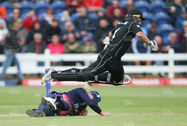 060617 - England v New Zealand, ICC Champions Trophy 2017, Cardiff - Neil Broom of New Zealand is forced to leap over Jason Roy of England as he tries to run him out