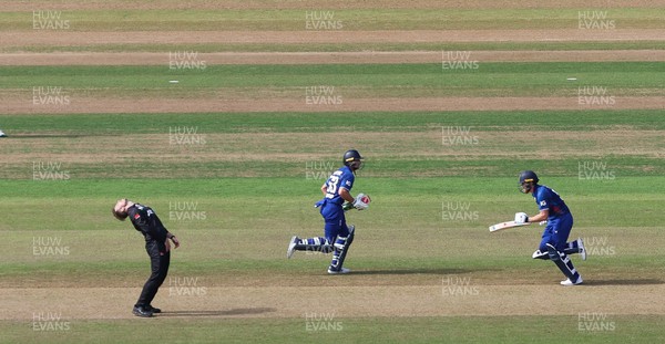 080923 - England v New Zealand, Metro Bank ODI Series - Lockie Ferguson of New Zealand reacts as Ben Stokes of England and Jos Buttler of England build their partnership