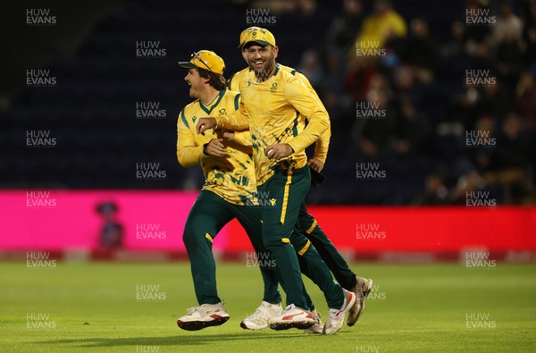 100925 - England v South Africa - 1st T20I - Donovan Ferreira of South Africa celebrates after catching the ball to dismiss Jacob Bethell