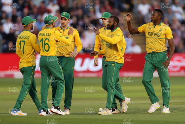 280722 - England v South Africa - IT20 - Andile Phehlukwayo of South Africa celebrates as Joe Butler walks off after being caught out by Reeza Hendricks