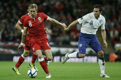 06.09.11 -  England v Wales -UEFA Euro 2012 Qualifier Group G ....  Wales's Jack Collison brings the ball forward chased by England's Frank Lampard. 