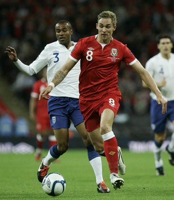 06.09.11 -  England v Wales -UEFA Euro 2012 Qualifier Group G ....  Wales's Jack Collison brings the ball forward chased by England's Ashley Cole. 