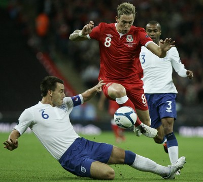 06.09.11 -  England v Wales -UEFA Euro 2012 Qualifier Group G ....  Wales's Jack Collison tackled by England's John Terry. 