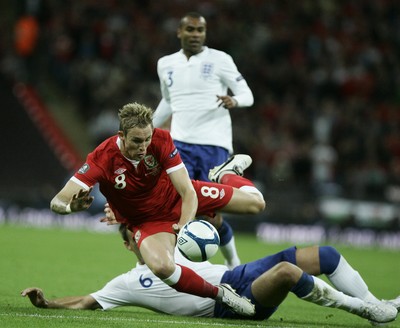06.09.11 -  England v Wales -UEFA Euro 2012 Qualifier Group G ....  Wales's Jack Collison tackled by England's John Terry. 