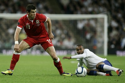 06.09.11 -  England v Wales -UEFA Euro 2012 Qualifier Group G ....  Wales's Gareth Bale evades England's Ashley Cole's tackle. 
