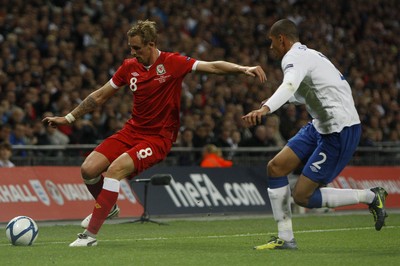 06.09.11 -  England v Wales -UEFA Euro 2012 Qualifier Group G ....  Wales's Jack Collison brings the ball forward chased by England's Chris Smalling. 