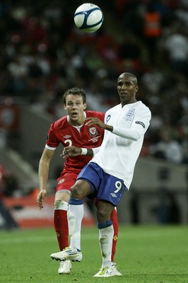 06.09.11 -  England v Wales -UEFA Euro 2012 Qualifier Group G ....  England's Ashley Young controls the ball under pressure from Wales's Chris Gunter. 