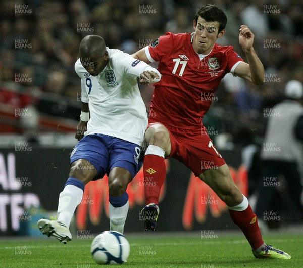 06.09.11 -  England v Wales -UEFA Euro 2012 Qualifier Group G ....  England's Ashley Young is put under pressure from Wales's Gareth Bale. 