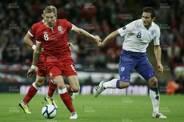 06.09.11 -  England v Wales -UEFA Euro 2012 Qualifier Group G ....  Wales's Jack Collison brings the ball forward chased by England's Frank Lampard. 