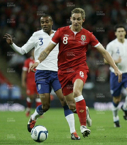 06.09.11 -  England v Wales -UEFA Euro 2012 Qualifier Group G ....  Wales's Jack Collison brings the ball forward chased by England's Ashley Cole. 