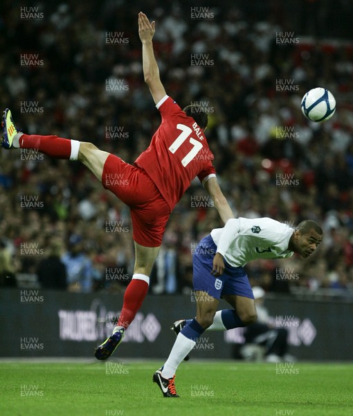 06.09.11 -  England v Wales -UEFA Euro 2012 Qualifier Group G ....  Wales's Gareth Bale jumps for the ball above England's Ashley Cole. 