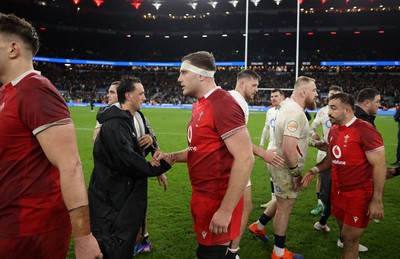 070226 - England v Wales - Guinness Six Nations - Alex Mitchell of England and Ben Carter of Wales at full time