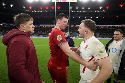 070226 - England v Wales - Guinness Six Nations - Adam Beard of Wales and Sam Underhill of England at full time