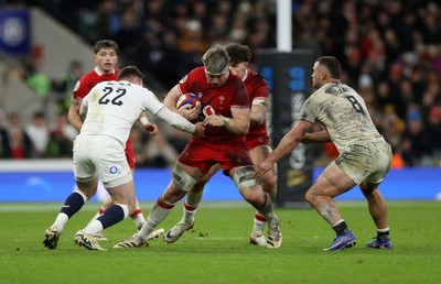 070226 - England v Wales - Guinness Six Nations - Aaron Wainwright of Wales is tackled by Ben Spencer of England 