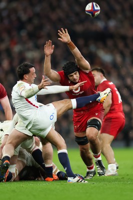 070226 - England v Wales, 2026 Guinness Six Nations - Dafydd Jenkins of Wales looks to charge down the kick by Alex Mitchell of England