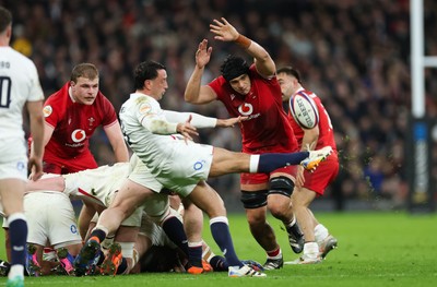 070226 - England v Wales, 2026 Guinness Six Nations - Dafydd Jenkins of Wales looks to charge down the kick by Alex Mitchell of England
