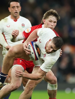 070226 - England v Wales, 2026 Guinness Six Nations - Freddie Steward of England  is tackled by Ellis Mee of Wales