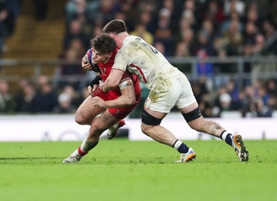 070226 - England v Wales, 2026 Guinness Six Nations - Eddie James of Wales is tackled by Tom Curry of England