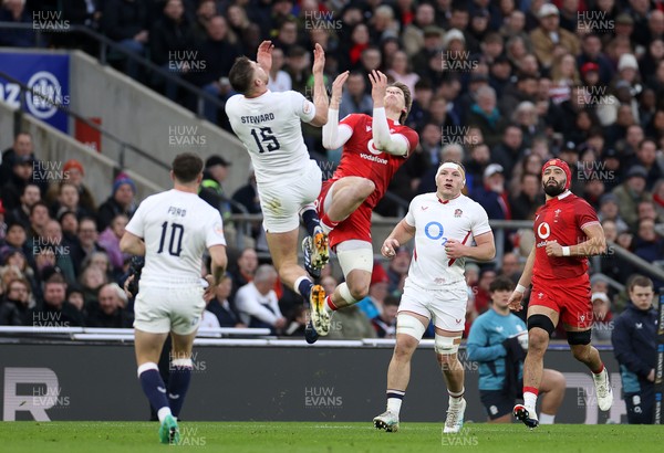 070226 - England v Wales - Guinness Six Nations - Ellis Mee of Wales goes up for the ball with Freddie Steward of England 