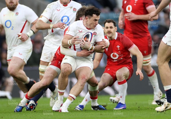 070226 - England v Wales - Guinness Six Nations - Henry Arundell of England is tackled by Ellis Mee of Wales 