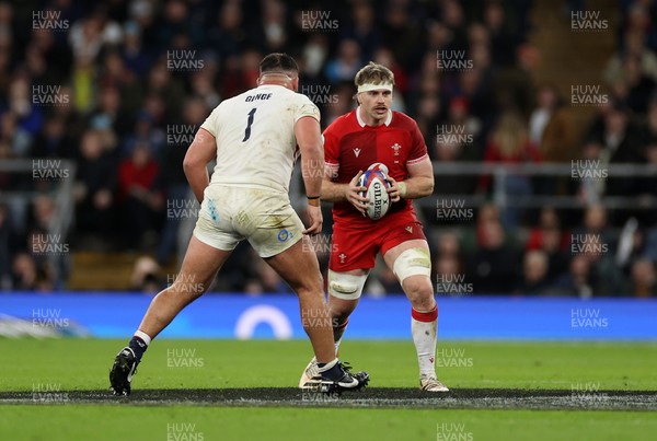 070226 - England v Wales - Guinness Six Nations - Aaron Wainwright of Wales is challenged by Ellis Genge of England 