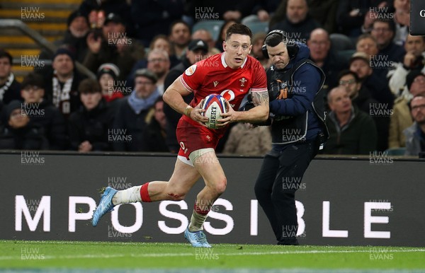 070226 - England v Wales - Guinness Six Nations - Josh Adams of Wales runs in to score a try