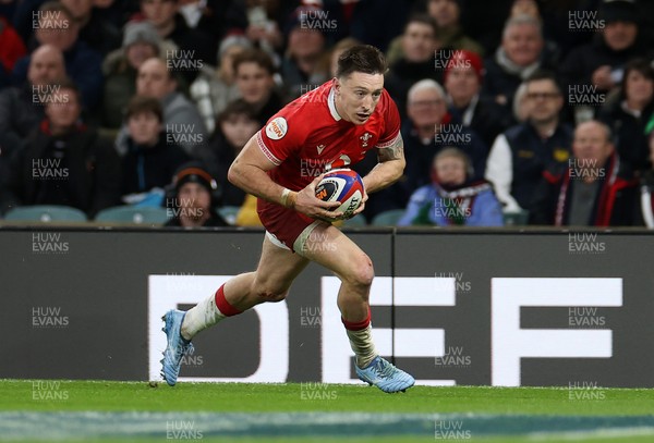 070226 - England v Wales - Guinness Six Nations - Josh Adams of Wales runs in to score a try