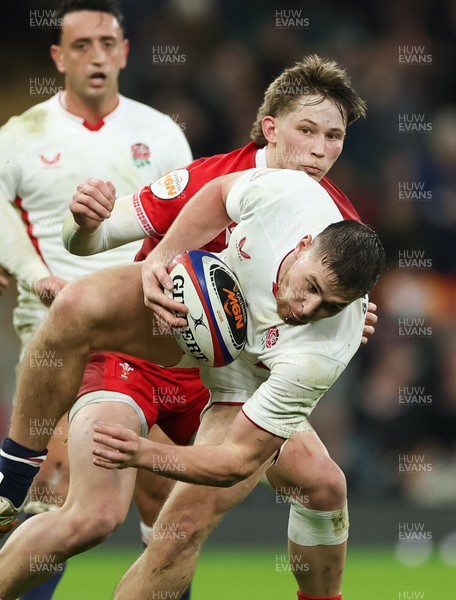 070226 - England v Wales, 2026 Guinness Six Nations - Freddie Steward of England  is tackled by Ellis Mee of Wales