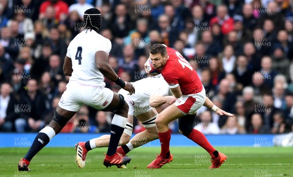 070320 - England v Wales - Guinness Six Nations - Dan Biggar of Wales is tackled by Mark Wilson of England
