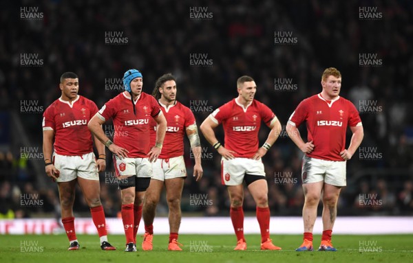 070320 - England v Wales - Guinness Six Nations - LeonBrown, Justin Tipuric, Josh Navidi, George North and Rhys Carre of Wales looks dejected at the end of the game