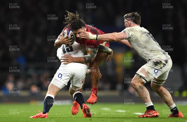 070320 - England v Wales - Guinness Six Nations - Josh Navidi of Wales is tackled by Elliot Daly of England