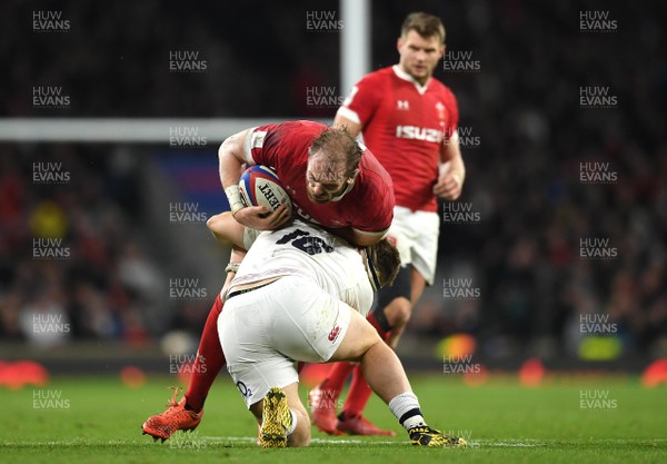 070320 - England v Wales - Guinness Six Nations - Alun Wyn Jones of Wales is tackled by Luke Cowan-Dickie of England