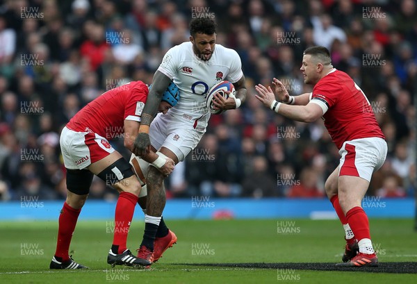 070320 - England v Wales - Guinness 6 Nations Championship - Courtney Lawes of England is tackled by Justin Tipuric of Wales