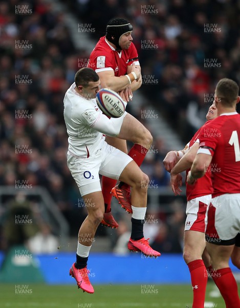 070320 - England v Wales - Guinness 6 Nations Championship - Jonny May of England collides with Leigh Halfpenny of Wales in the air