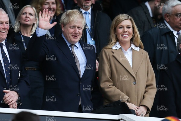 070320 - England v Wales, Guinness Six Nations 2020 - Prime Minister Boris Johnson and Carrie Symonds take their seats in the stand ahead of the match