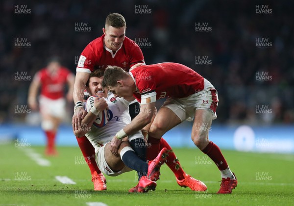 070320 - England v Wales, Guinness Six Nations 2020 - Henry Slade of England is tackled by George North of Wales and Liam Williams of Wales