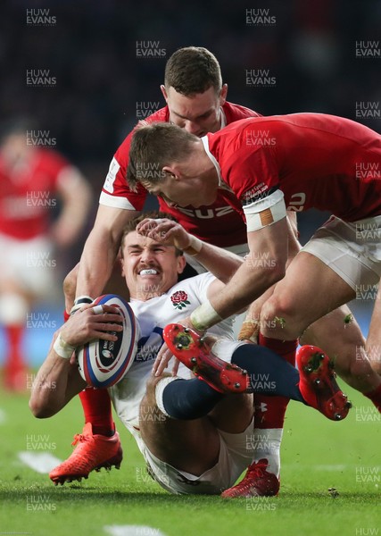 070320 - England v Wales, Guinness Six Nations 2020 - Henry Slade of England is tackled by George North of Wales and Liam Williams of Wales