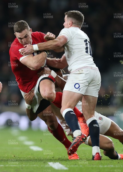 070320 - England v Wales, Guinness Six Nations 2020 - George North of Wales is tackled by Anthony Watson of England and George Ford of England
