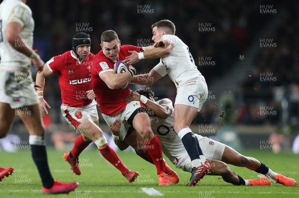 070320 - England v Wales, Guinness Six Nations 2020 - George North of Wales is tackled by Anthony Watson of England and George Ford of England