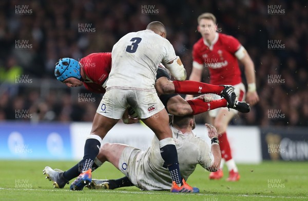 070320 - England v Wales, Guinness Six Nations 2020 - Justin Tipuric of Wales is tackled by Kyle Sinckler of England