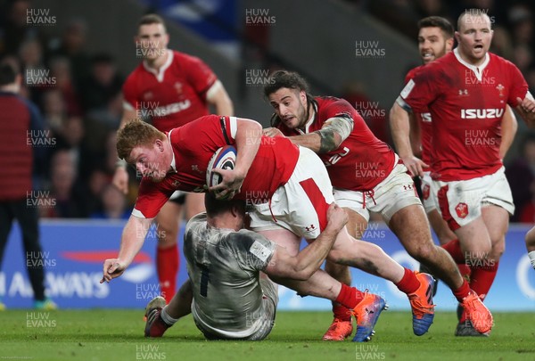 070320 - England v Wales, Guinness Six Nations 2020 - Rhys Carre of Wales is tackled just short of the line by Joe Marler of England 