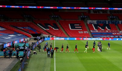 081020 - England v Wales - International Friendly -  Wales players walk out