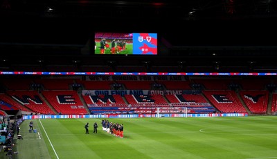 081020 - England v Wales - International Friendly -  Wales and England players line up for the anthems