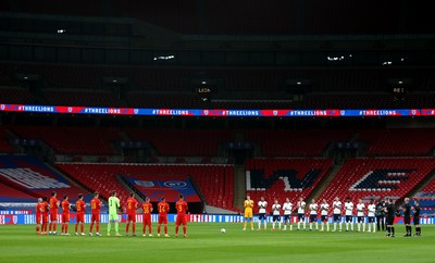 081020 - England v Wales - International Friendly -  England and Wales players during a moments applause before kick off