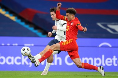 081020 - England v Wales - International Friendly -  Jack Grealish of England gets the ball past Ethan Ampadu of Wales