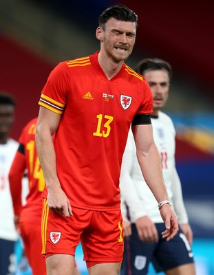 081020 - England v Wales - International Friendly -  Kieffer Moore of Wales shows signs of an injury