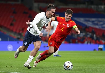 081020 - England v Wales - International Friendly -  Jack Grealish of England tries to get past Ben Davies of Wales