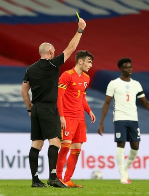 081020 - England v Wales - International Friendly -  Dylan Levitt of Wales is shown a yellow card